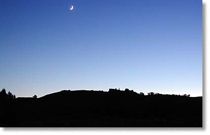 Moon over mesa silhouette