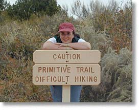Penelope with Primitive Trail sign